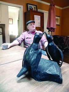 Seattle artist Tony Angell with Courting Guillemots. Angell created the sculpture