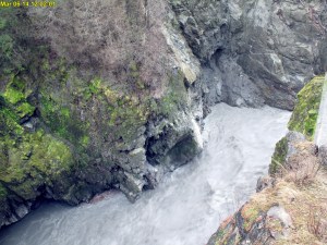 The Elwha River is seen rushing over the remnants of Glines Canyon Dam on Thursday afternoon.  National Park Service