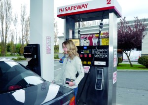 Grace Krabill pumps gas at the Port Townsend Safeway