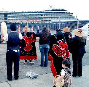 Lower Elwha Klallam tribal members welcome the ms Oosterdam when the 950-foot cruise ship visited Port Angeles in 2012. The liner makes a return visit May 9.  Photo by Keith Thorpe/Peninsula Daily News
