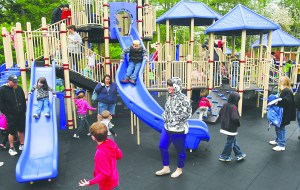 The scene at Saturdays grand opening of the Shane Park playground in Port Angeles.  -- Photo by Keith Thorpe/Peninsula Daily News
