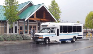 A Clallam Transit bus parks at a temporary bus stop on Cedar Street in front of the Sequim Transit Center after the regular bus lane was closed to accommodate construction of the new Sequim City Hall.  Photo by Keith Thorpe/Peninsula Daily News