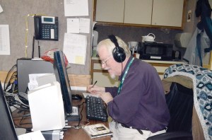 KPTZ-FM volunteer Steve Oakford logs tape at the station Tuesday. The three-year old community station is one of several nonprofit tenants at the Mountain View Campus.  Charlie Bermant/Peninsula Daily News
