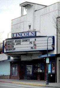 The Lincoln Theater's marquee shows its final run of movies before it was closed for good March 2. The downtown Port Angeles landmark likely goes up for sale later this month.  —Peninsula Daily News photo