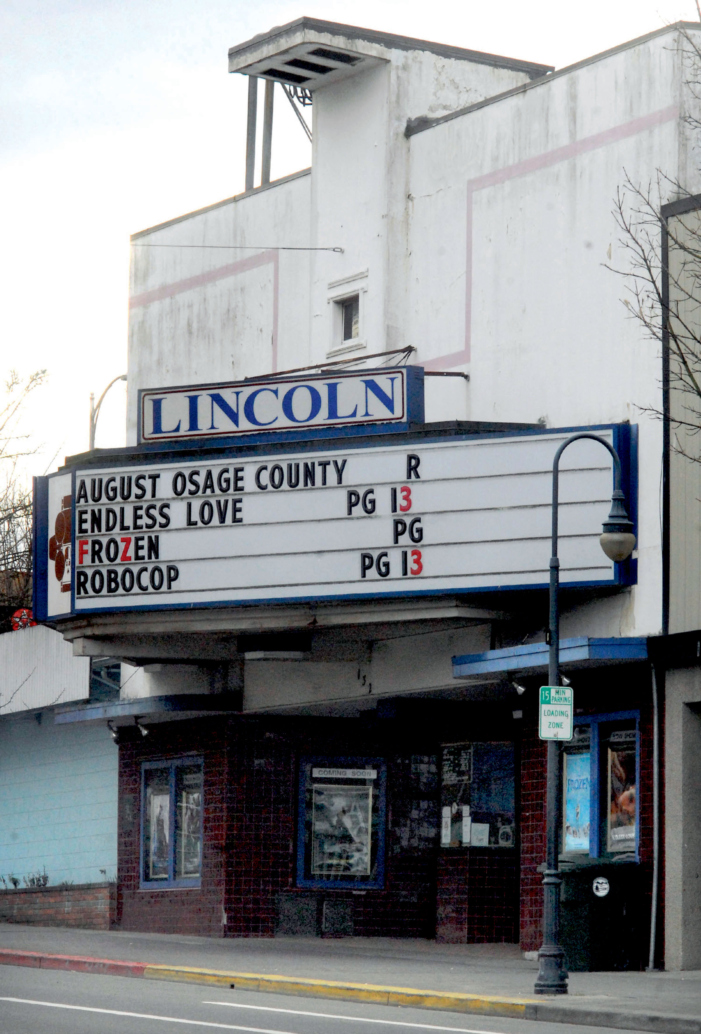 The Lincoln Theater's marquee shows its final run of movies before it was closed for good March 2. The downtown Port Angeles landmark likely goes up for sale later this month.  —Peninsula Daily News photo