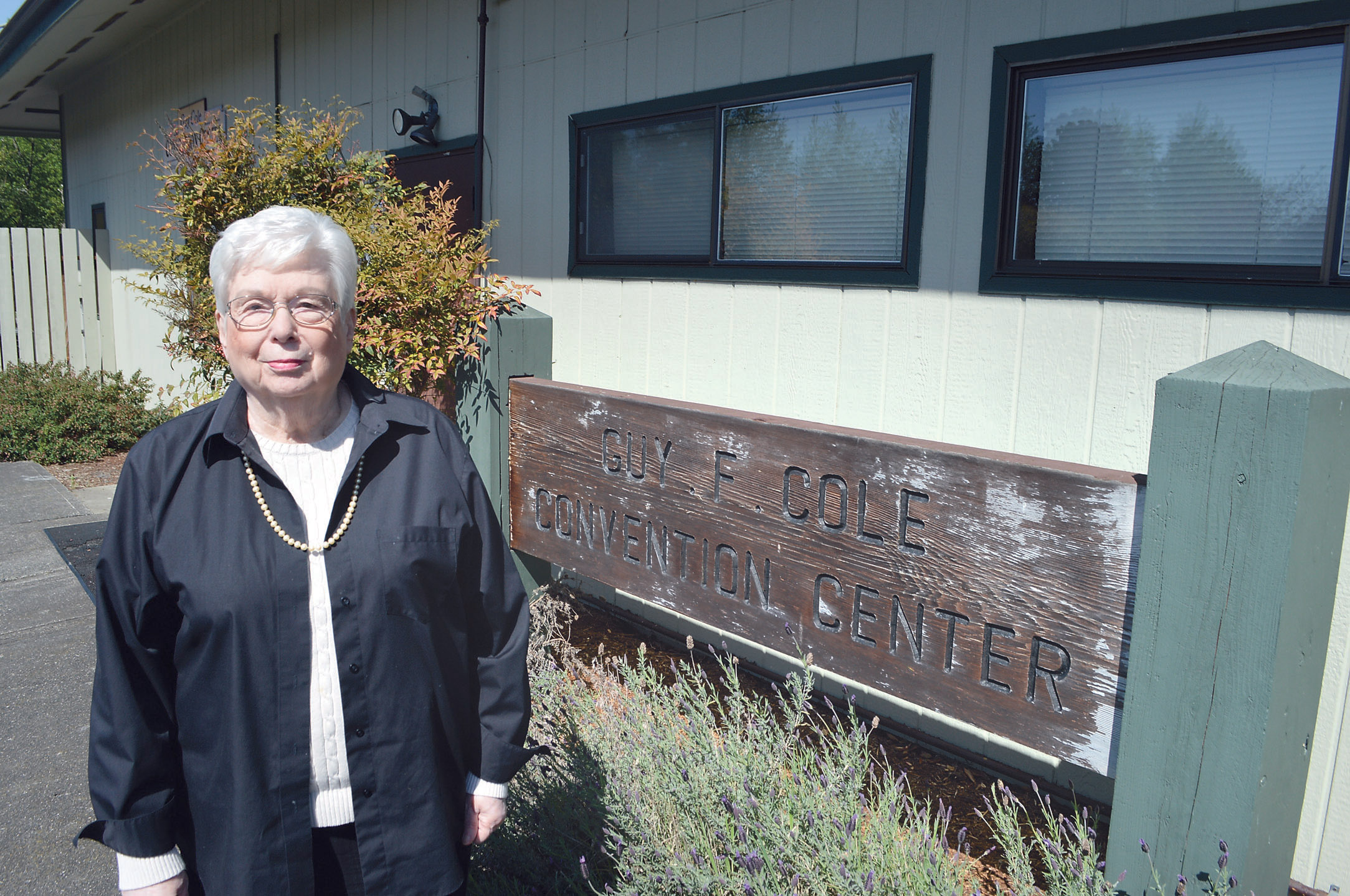 Pat Johansen stands in front of the Guy Cole Convention Center in Sequim on Tuesday. Johansen will lead an effort in the coming months to study a revitalization of the citys seldom-used