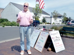 Free-speech advocate Richard Olson was back in his spot in Pope Marine Park on Thursday after an absence of 21/2 weeks. He is due to appear in Jefferson County District Court on May 28 to face code-violation charges.  Charlie Bermant/Peninsula Daily News