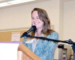Unopposed Jefferson County Treasurer candidate Stacie Hoskins addresses Democrats on Tuesday night at a party gathering in Port Townsend.  Charlie Bermant/Peninsula Daily News