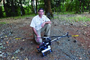 Tyson Shultz of the Oregon Department of Forestry is seen with a radio-controlled helicopter at the departments compound on the outskirts of Grants Pass