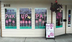 The front window of Angeles Beauty Supply & Salon was one of two decorated shop windows to take first place in the sixth annual Pink Up Port Angeles window contest. Keith Thorpe/Peninsula Daily News