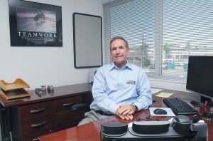 Marc Jackson pauses in his new office at Port Angeles School District headquarters.  Photo by Keith Thorpe/Peninsula Daily News