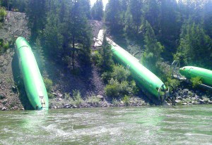 Three Boeing 737 fuselages lie on the embankment of Clark Fork River near Alberton