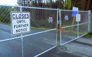 Closed signs and a gate bar entrance to the Blue Mountain Transfer Station east of Port Angeles last November following a fire.  Keith Thorpe/Peninsula Daily News