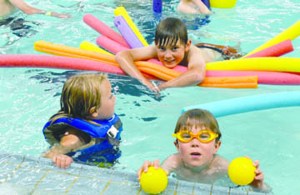 Children play in Port Townsends Mountain View Pool during Fridays 50th anniversary party