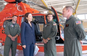 Sen. Maria Cantwell talks with the Coast Guard helicopter crew that rescued a mariner whose boat caught fire near Neah Bay a week ago. From left are Avionics Electrical Technician Ryan Hallam