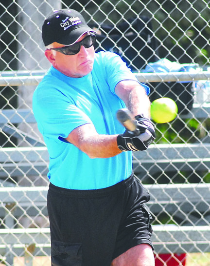 Gary Boor of Sequim bats for his team of Sequim and Port Angeles players against a team from Kent during 2013's Senior Games softball matchups at Shane Park in Port Angeles. Keith Thorpe/Peninsula Daily News