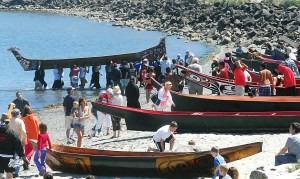 Canoes line Hollywood Beach in Port Angeles as participants in the Paddle to Quinault 2013 arrive at the traditional territory of the Lower Elwha Klallam tribe.  Keith Thorpe/Peninsula Daily News