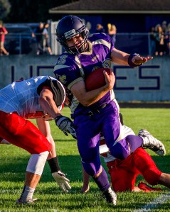 Sequim's Gavin Velarde leaves Coupeville defenders in his wake as he dances along the sideline last month. George Leinonen/for Peninsula Daily News