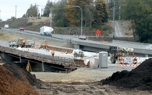 Construction work continues last week on the second of two new bridges where U.S. Highway 101 crosses McDonald Creek between Port Angeles and Sequim. Keith Thorpe/Peninsula Daily News