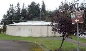 An unadorned water storage tank on Lauridsen Boulevard near the Port Angeles Fine Arts Center could receive a decorative mural arranged by Revitalize Port Angeles.  Keith Thorpe/Peninsula Daily News