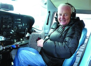 Former U.S. Rep. Al Swift sits in the plane that took him on an aerial inspection of the newly freed Elwha River.  -- Photo copyright &Copy; 2012 by John Gussman