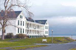 The stately Fort Worden Building 202 overlooks the Strait of Juan de Fuca. Peninsula Daily News photo