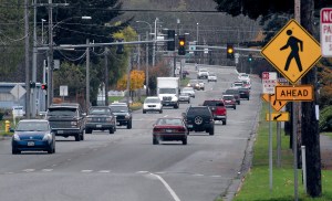 Traffic makes its way along South Race Street in Port Angeles on Thursday. The city is considering a plan to divide lanes of traffic along the busy thoroughfare.  Keith Thorpe/Peninsula Daily News