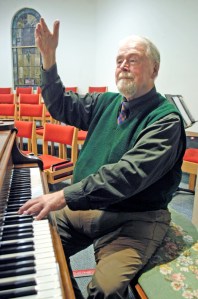 Jerome Wright directs the Olympic Girls Choir on Tuesday evening at Trinity United Methodist Church in Sequim. Chris McDaniel/Peninsula Daily News