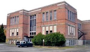 The Port Townsend School District has temporarily abandoned demolishing the Lincoln Building to study the prospects of its conversion to a low-cost housing facility.  Charlie Bermant/Peninsula Daily News