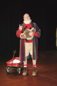 Bob Bronsink as Raynert Chisum tells the original Chrismas story. Kate Carter/Port Angeles Community Players