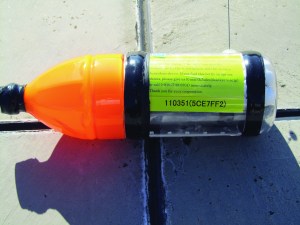 This NOAA photo shows one of the multicolored tracking bottles.