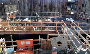 A crew works at the site of a new wastewater pump station being built at the west end of Front Street at Marine Drive in downtown Port Angeles.  Keith Thorpe/Peninsula Daily News