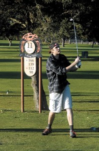 Jacob Haynes of Issaquah tees off on the 11th hole at The Cedars at Dungeness golf course near Sequim.  Keith Thorpe/Peninsula Daily News