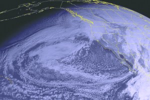 This NOAA satellite image taken Saturday at 10 a.m. Pacific time shows a large storm system continuing to impact the Pacific Northwest. This storm will bring heavy rain and snow showers to the area. Flooding is still possible for parts of Washington and Oregon.  The Associated Press
