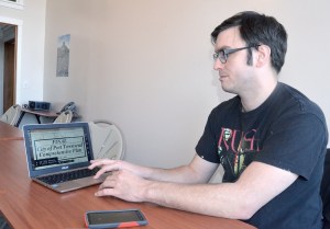 Newly appointed Port Townsend Planning Commissioner Paul Rice goes online to refer to the upcoming comprehensive plan.  Charlie Bermant/Peninsula Daily News