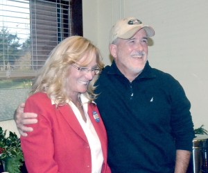 Retiring Jefferson County Auditor Donna Eldridge gets an appreaciative hug from former Assessor Jack Westerman III
