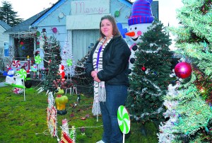 Ivy Mathison has placed ornaments honoring children killed in the Newtown