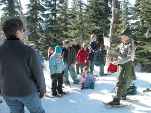 An Olympic National Park ranger leads a snowshoe hike at Hurricane Ridge.  National Park Service