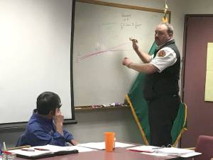 Fire chief Ben Andrews for Clallam County District 3 speaks with fire commissioners Nov. 21 about the districts finances going forward. Currently, the district is investigating a levy lid lift for voters in November 2018. (Matthew Nash/Olympic Peninsula News Group)