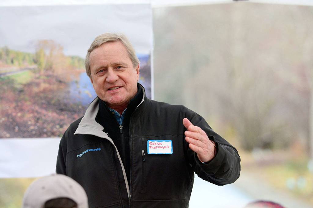 State Rep. Steve Tharinger, D-Sequim, tells those who attended the opening celebration of the section of the Olympic Discovery Trail along South Discovery Bay that restoring habitat and extending the trail are important for the community. (Jesse Major/Peninsula Daily News)