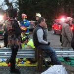 First responders work at the scene of an Amtrak train that derailed in DuPont, south of Seattle, on Monday. (Daniella Fenelon via AP)