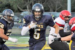 ALL-PENINSULA FOOTBALL MVP: Forks’ Cole Baysinger runs away with honor