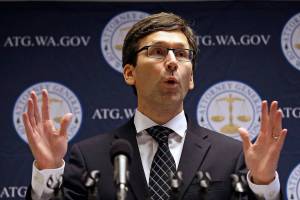 Washington expands lawsuit against Comcast over service plan