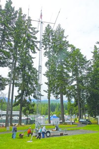 The 100-foot retractable antenna came down Sunday at the Clallam County Fairgrounds. Chris Tucker/Peninsula Daily News