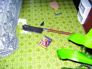 An evidence photograph shows the size of the “beef splitter” ax that Clallam County deputies said a Sequim man used in an attack for which he was sentenced last week. Clallam County Sheriff's Office