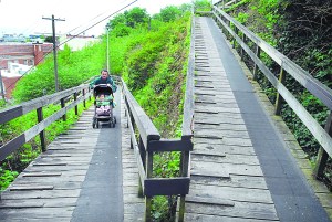Joseph Kenney of Port Angeles pushes his daughter