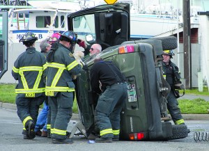 Port Angeles firefighters assist Dennis L. Houk