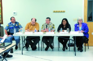 The local panel at the state Commission on Hispanic Affairs meeting in Forks includes