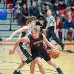 Port Townsends Kaiden Parcher runns around Klahowyas Lucas Becker during a game on Friday in Port Townsend. (Steve Mullensky/for Peninsula Daily News)