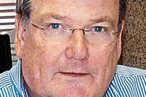 Charlie Bermant/Peninsula Daily NewsDan Di Guilio in his new office, general manager Jefferson Transit.